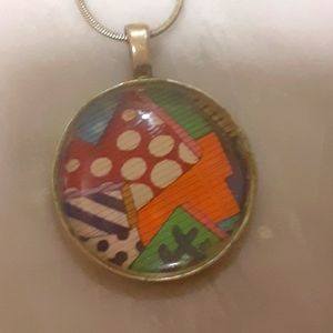 Print Circle design necklace on 18" metal snake chain.